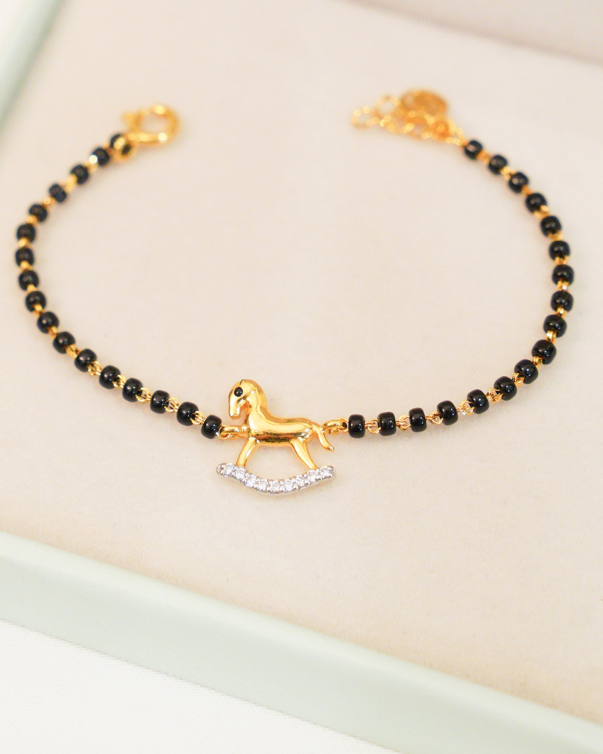 Rocking Horse Nazariya for babies — BIS Hallmarked evil eye nazariya, by Rajasi Jindal