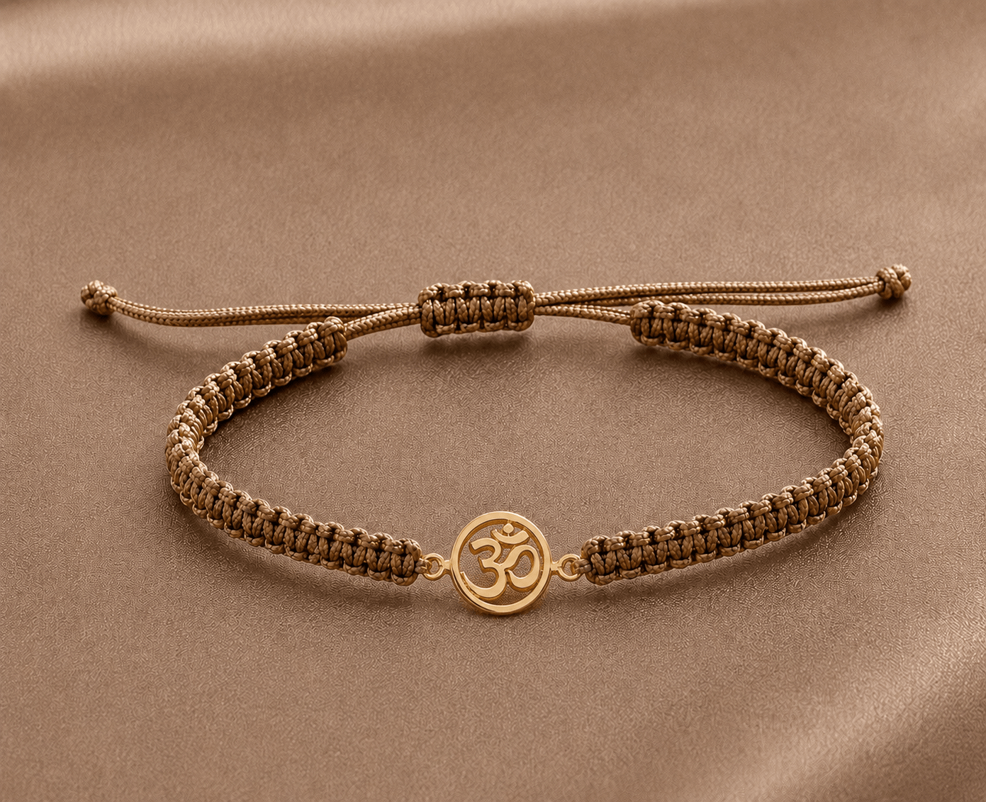 Om Gold Tie-Up rakhi for kids in BIS Hallmarked gold by Rajasi Jindal