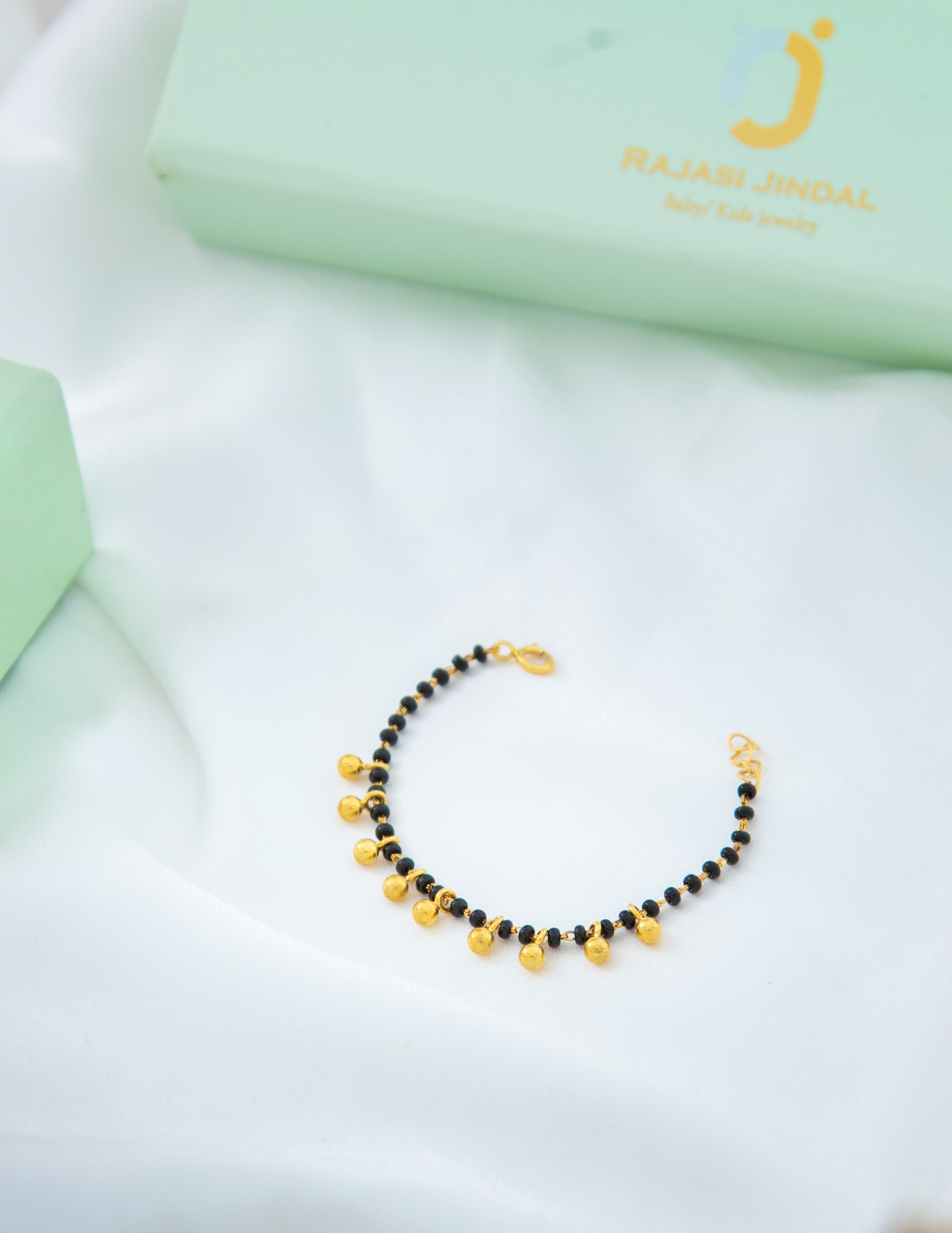 Ghungroo Gold Nazariya for babies — BIS Hallmarked gold evil eye, by Rajasi Jindal