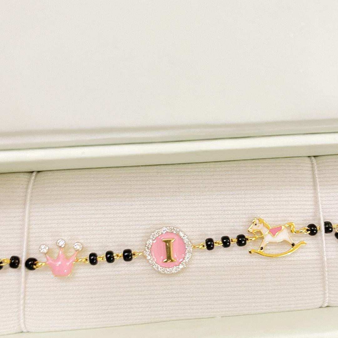 Initial 3 Motif Gold Nazariya for babies — BIS Hallmarked gold evil eye, by Rajasi Jindal