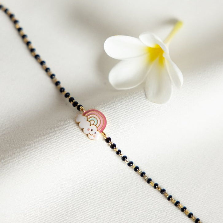 Rainbow Pink Gold Nazariya for babies — BIS Hallmarked gold evil eye, by Rajasi Jindal