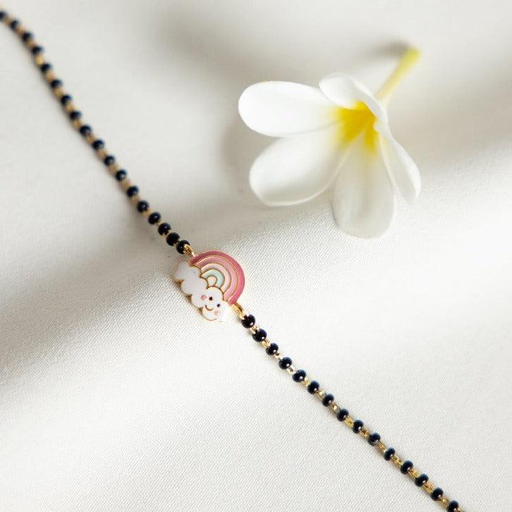 Rainbow Pink Gold Nazariya for babies — BIS Hallmarked gold evil eye, by Rajasi Jindal
