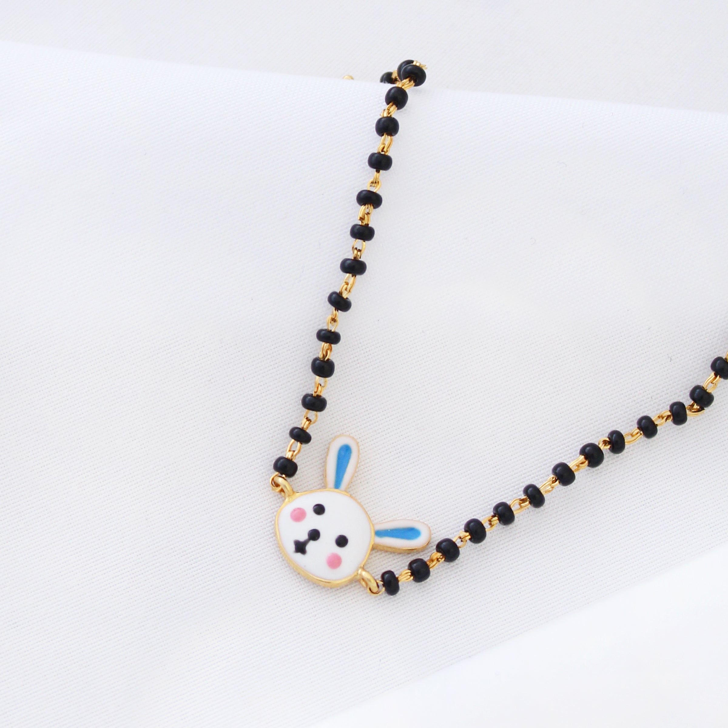 Being Bunny Blue Gold Nazariya for babies — BIS Hallmarked gold evil eye, by Rajasi Jindal