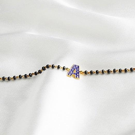 Blue Initial Gold Nazariya for babies — BIS Hallmarked gold evil eye, by Rajasi Jindal