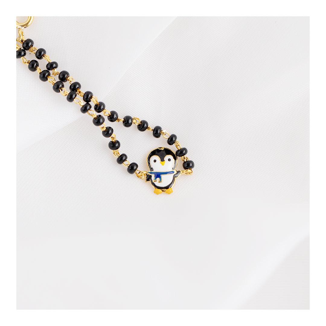 The Playful Penguin Nazariya for babies — BIS Hallmarked evil eye nazariya, by Rajasi Jindal