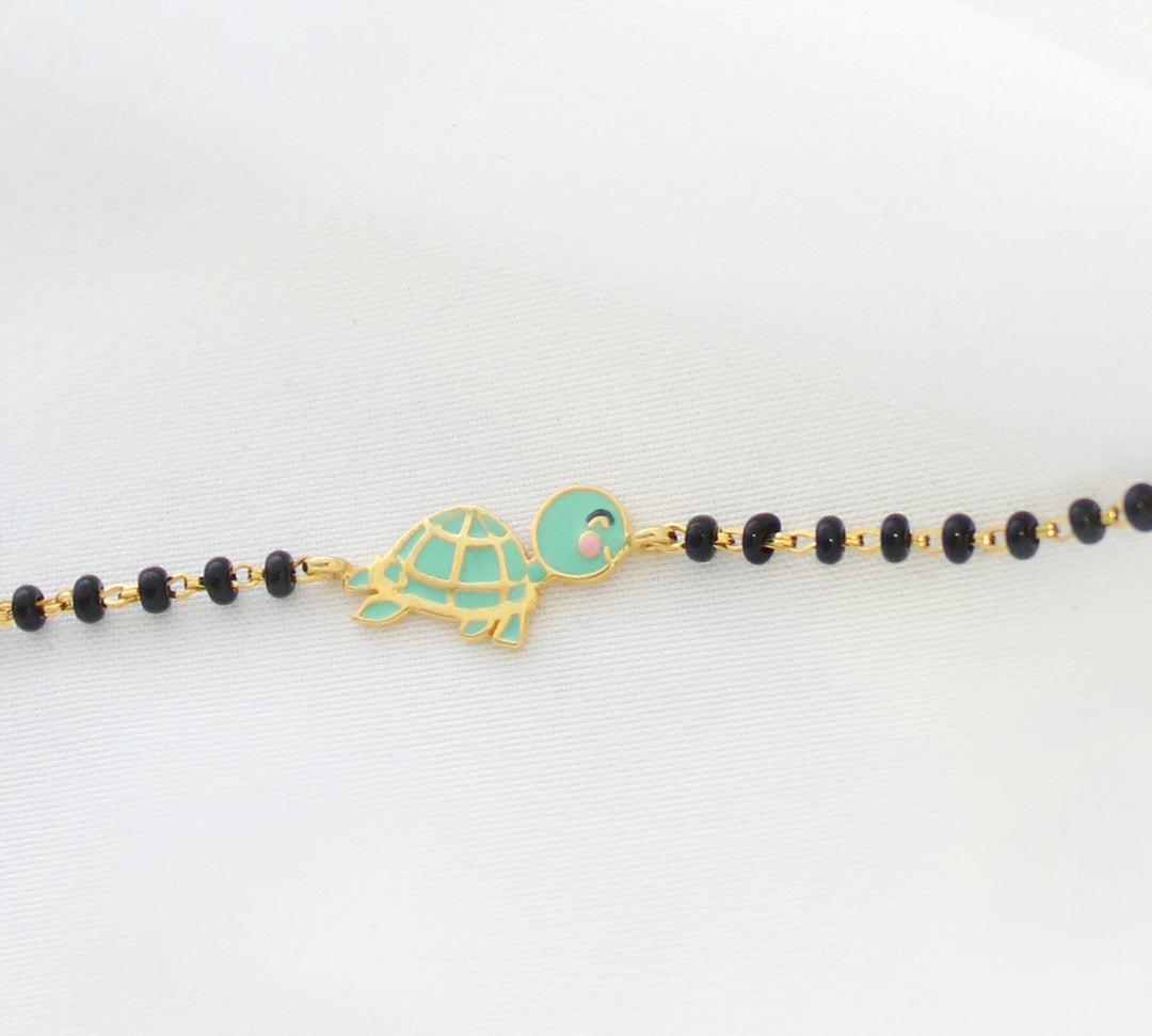 Behold the Turtle Gold Nazariya