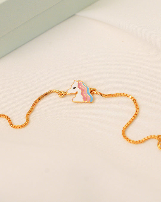 Gold bracelet with unicorn cham 