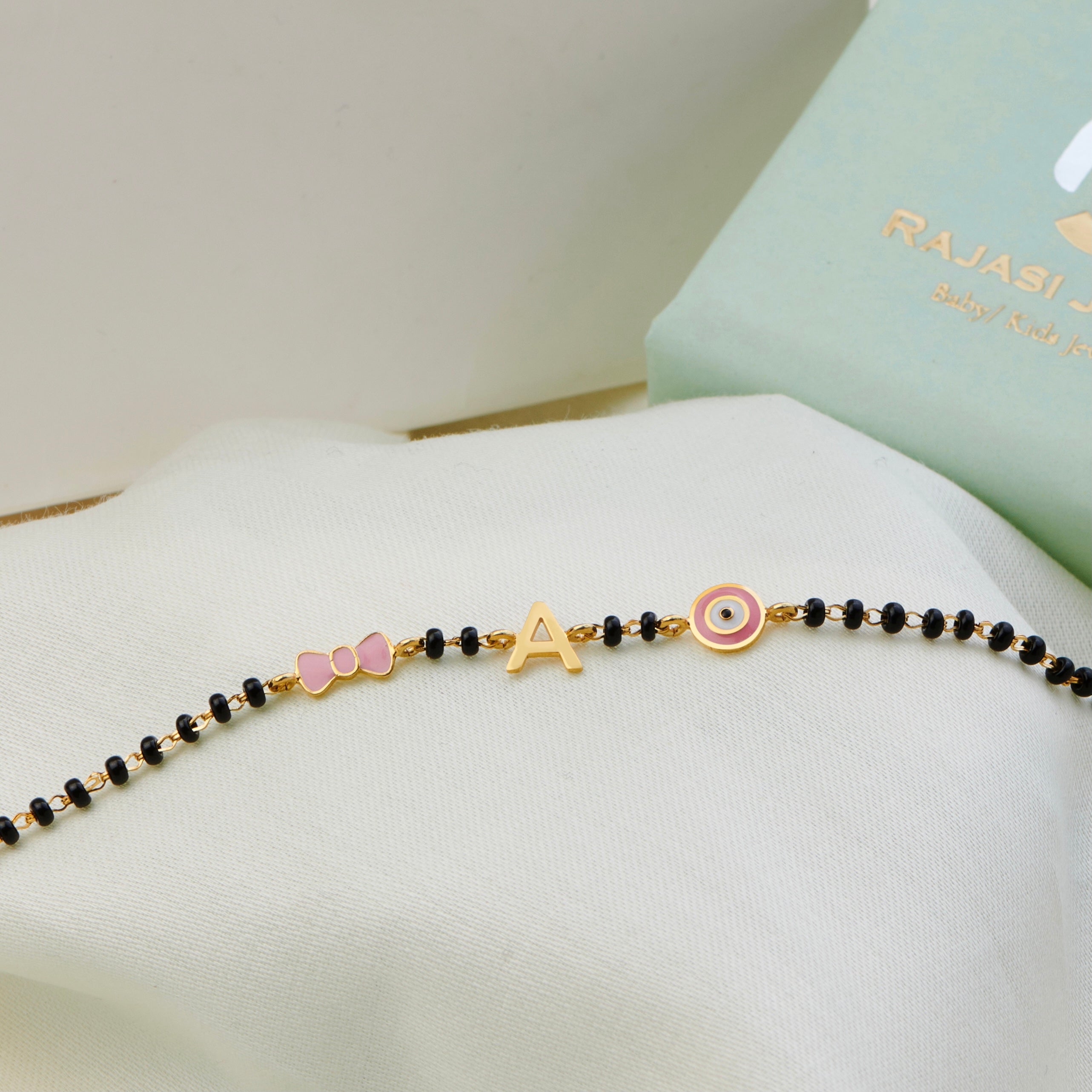 All Pink Initial Gold Nazariya for babies — BIS Hallmarked gold evil eye, by Rajasi Jindal