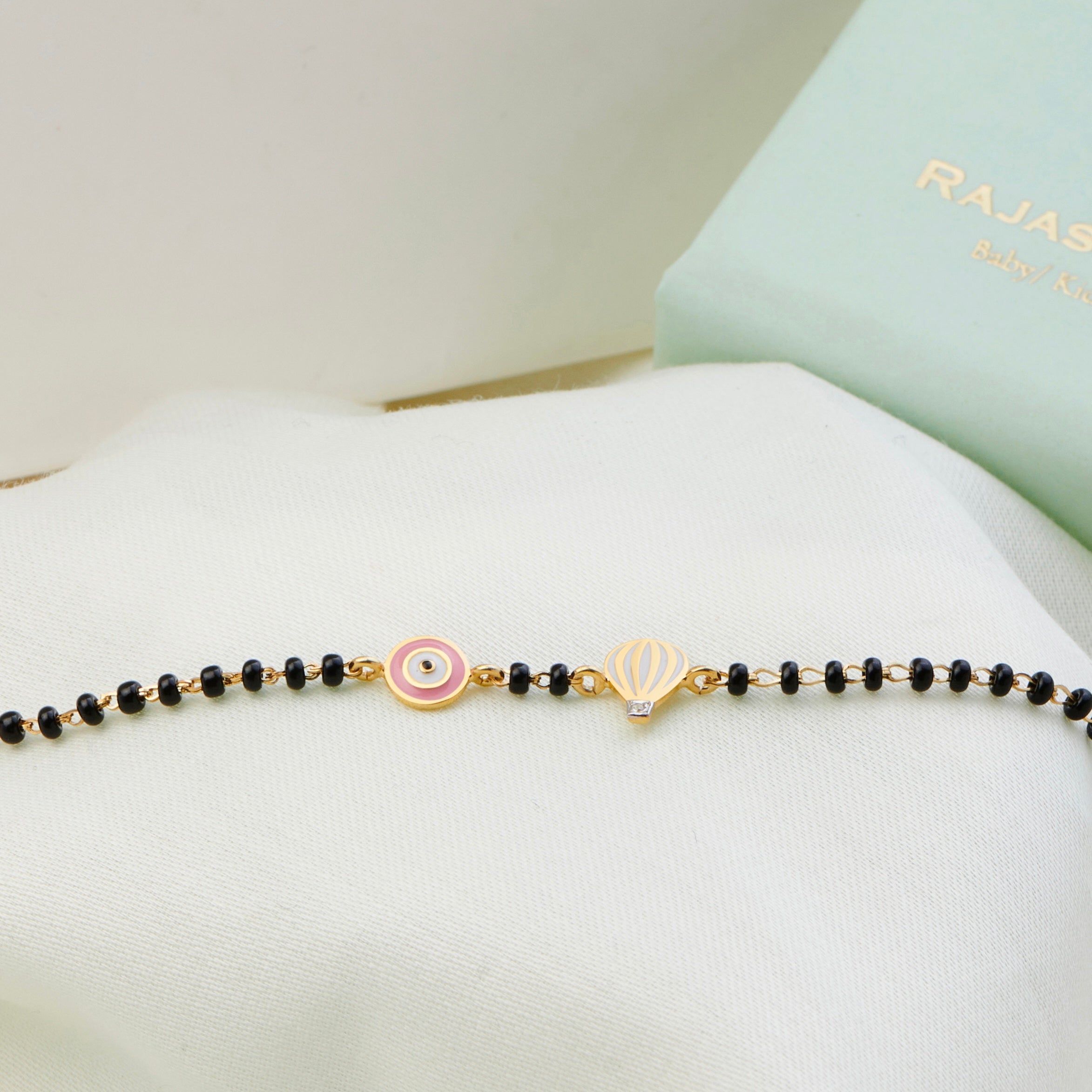 Pink Hot Air Balloon Gold Nazariya for babies — BIS Hallmarked gold evil eye, by Rajasi Jindal