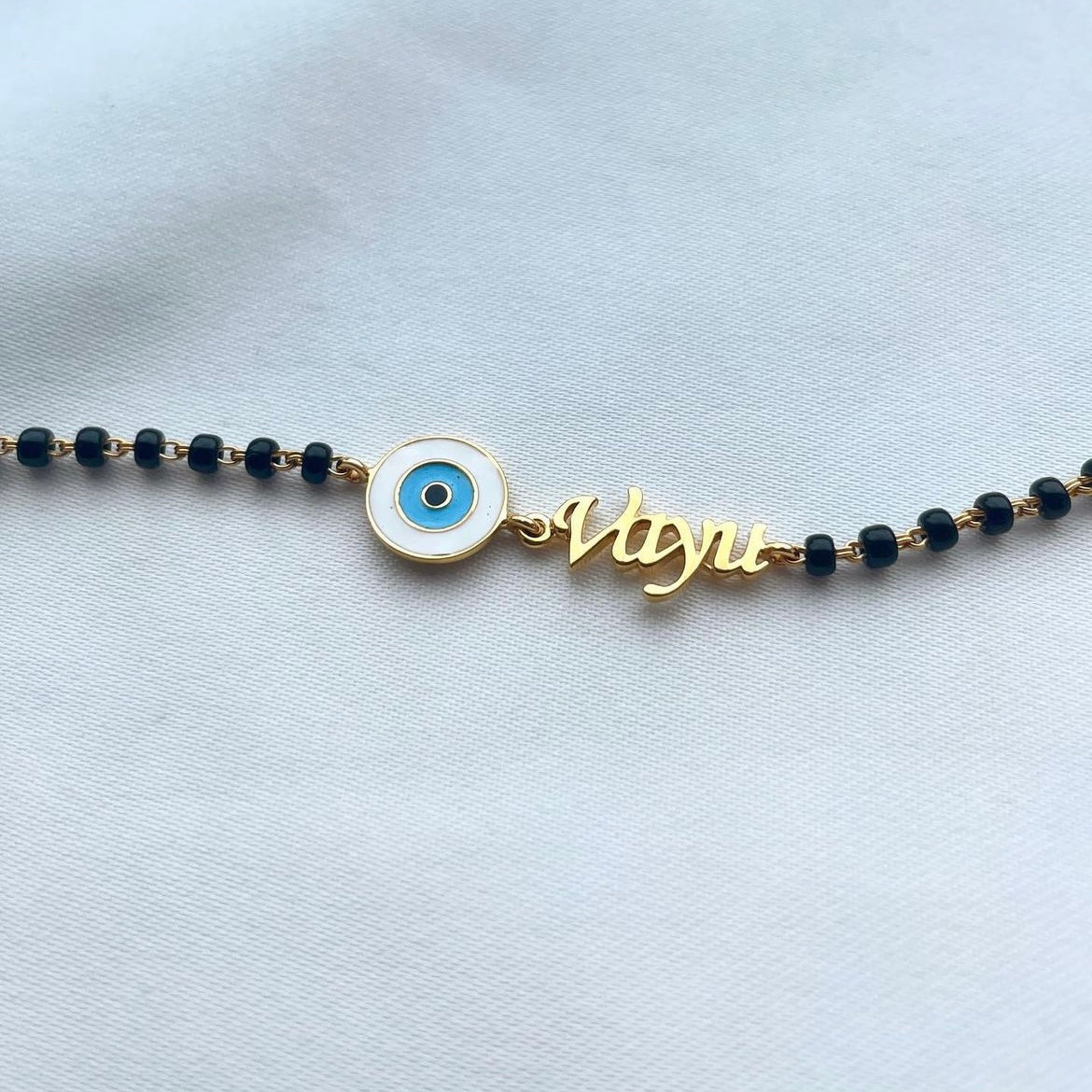 White Gold Blue Diamond Evil Eye Bracelet – Papas Jewelers