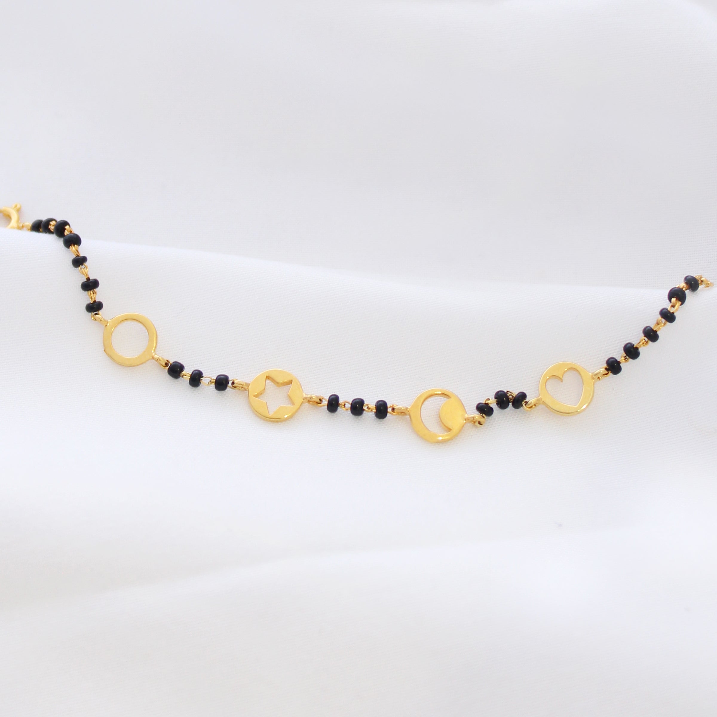 Sun and Moon Gold Nazariya for babies — BIS Hallmarked gold evil eye, by Rajasi Jindal